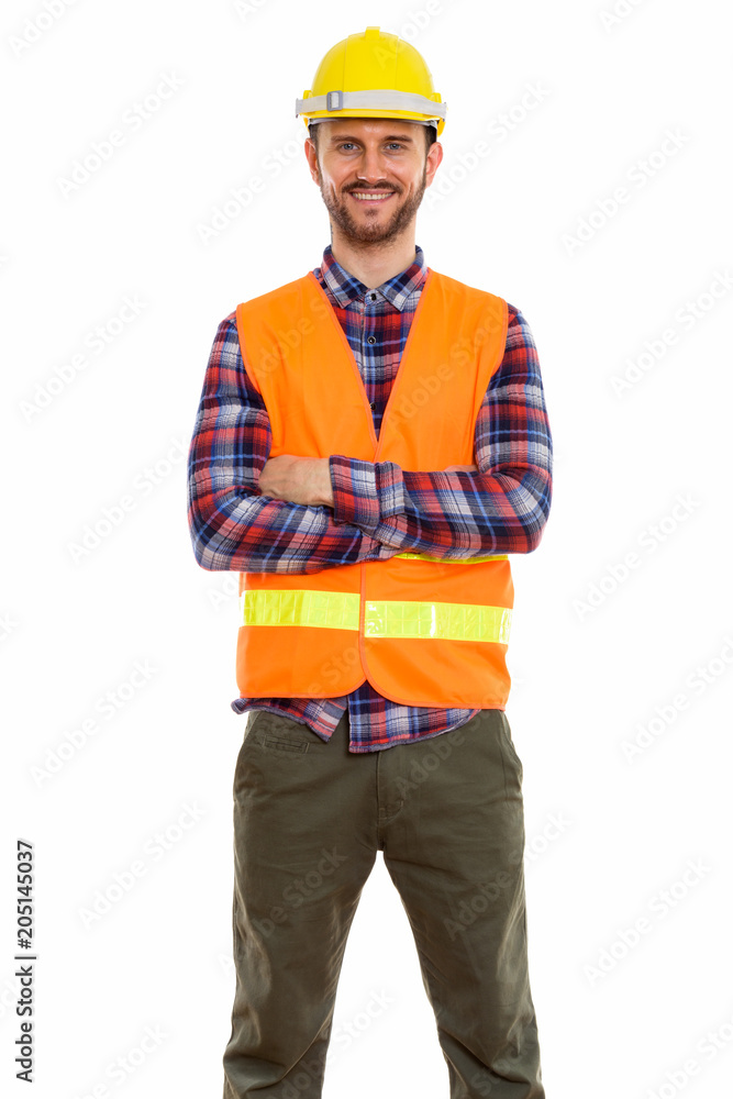 Young handsome bearded man construction worker Young handsome bearded man construction worker