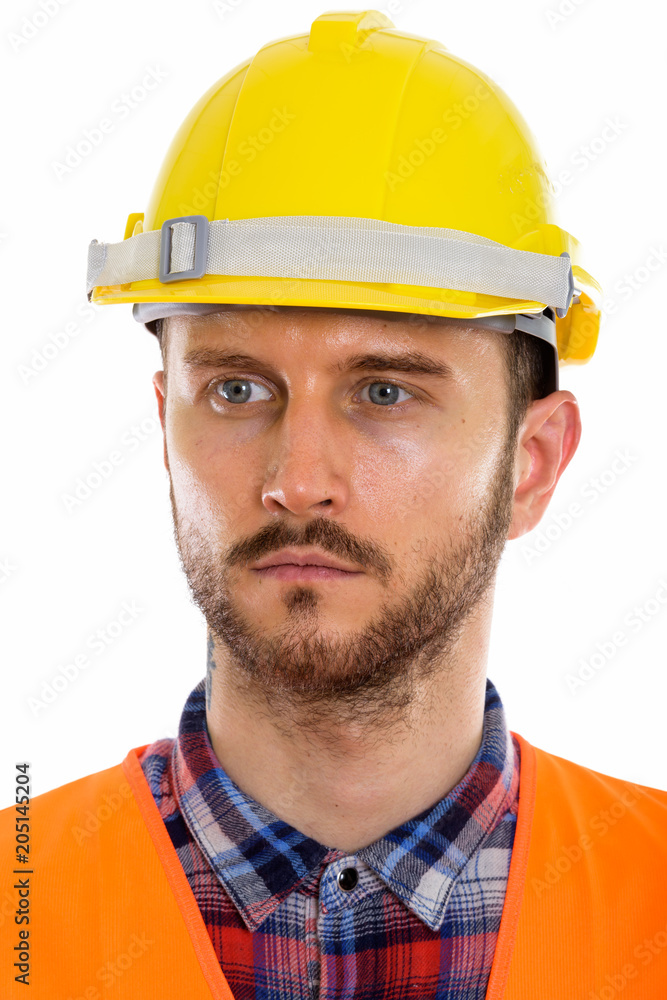 Young handsome bearded man construction worker Young handsome bearded man construction worker