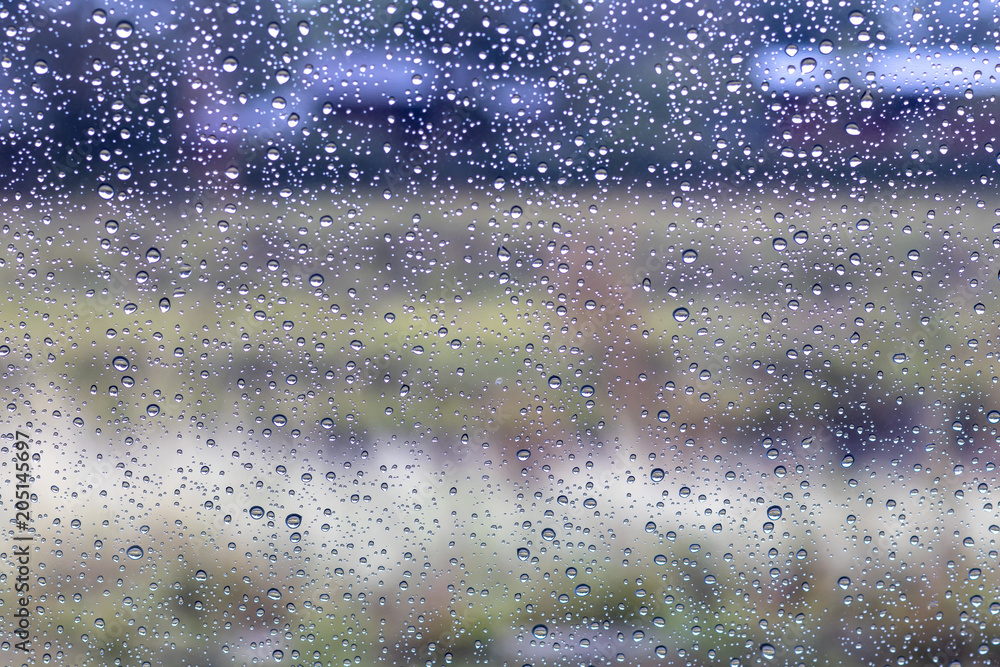 Rain drops on windshield with rural. Rain drops on windshield with rural.