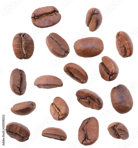 Close up fresh roasted coffee beans in various position isolated on white background.