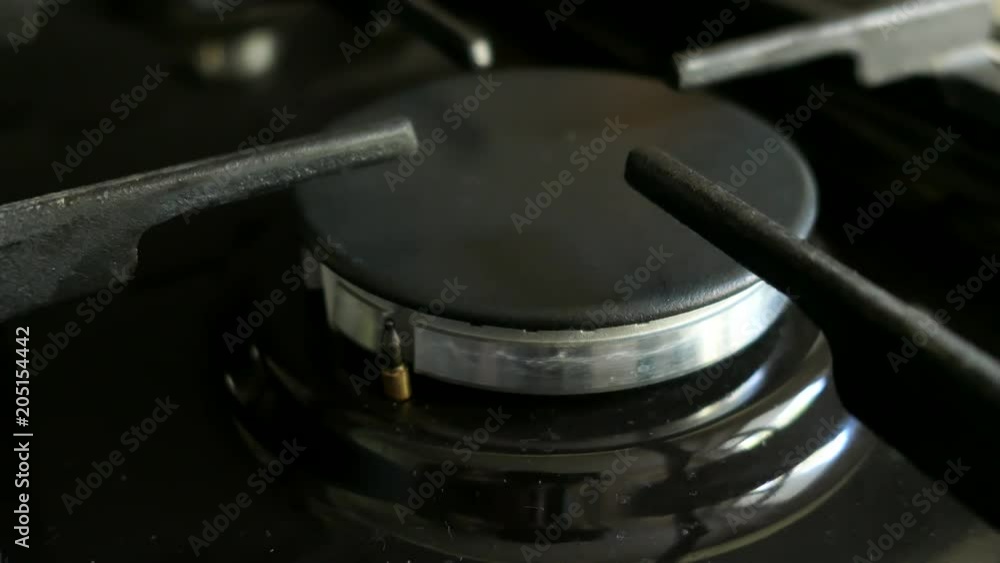 Gas Burner On The Stove In The Kitchen Gas Burner On The Stove In The Kitchen