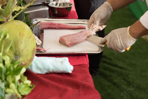 fresh fish cutting and prepare to cook by chef in a cooking class