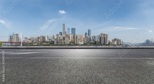 Panoramic skyline and buildings with empty road，chongqing city，china © MyCreative