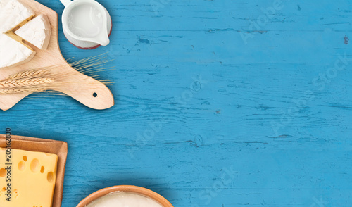 Dairy products on rustic wooden table