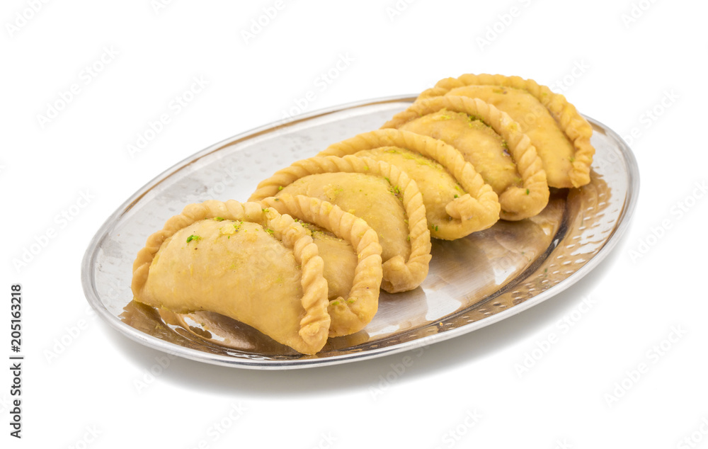 Gujiya or Gujia is a indian sweet dumpling made with suji, Maida or wheat flour and stuffed with khoya. It is common in North India, particularly in Bihar, Uttar Pradesh, Madhya Pradesh or Rajasthan Gujiya or Gujia is a indian sweet dumpling made with suji, Maida or wheat flour and stuffed with khoya. It is common in North India, particularly in Bihar, Uttar Pradesh, Madhya Pradesh or Rajasthan