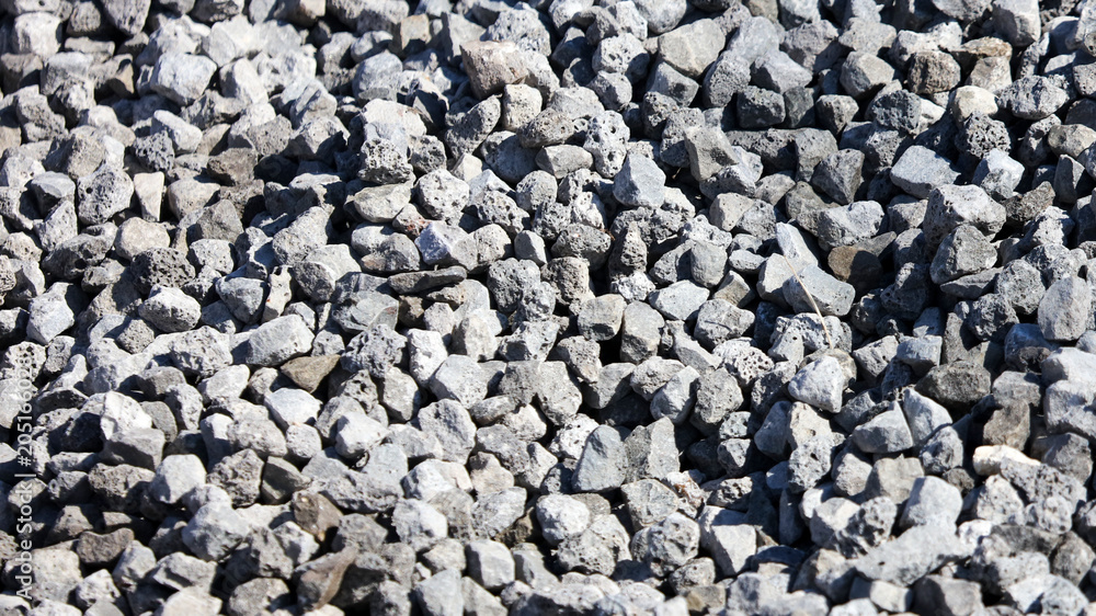 Stone crushed stone on the construction site as an abstract background Stone crushed stone on the construction site as an abstract background