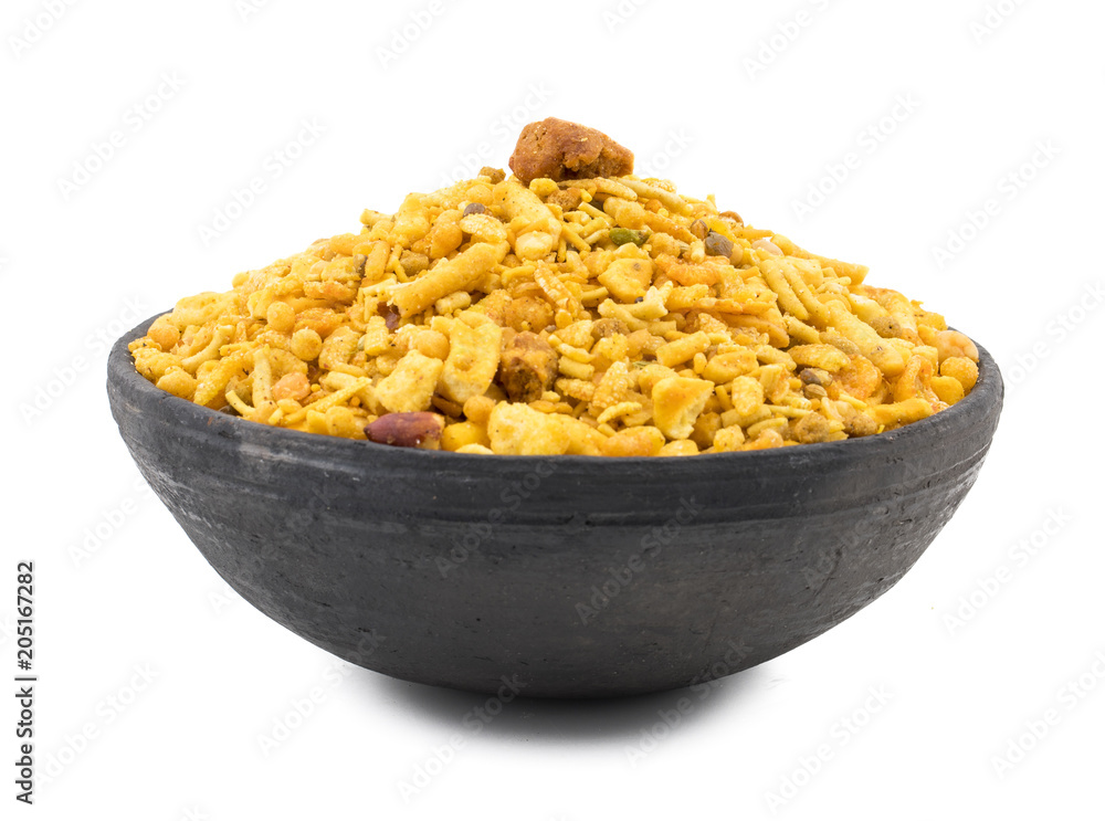Indian Delicious And Crunchy Mix Namkeen Food Also Know As Mixture, Chivda, Farsan, Namkin, Nimco or Nimko Made of Gram Flour And Mixed With Dry Fruits isolated on White Background