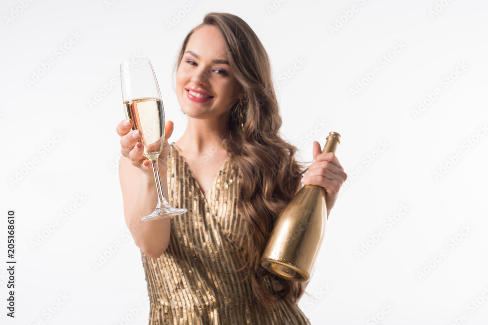 smiling attractive woman standing with bottle and glass of champagne isolated on white smiling attractive woman standing with bottle and glass of champagne isolated on white