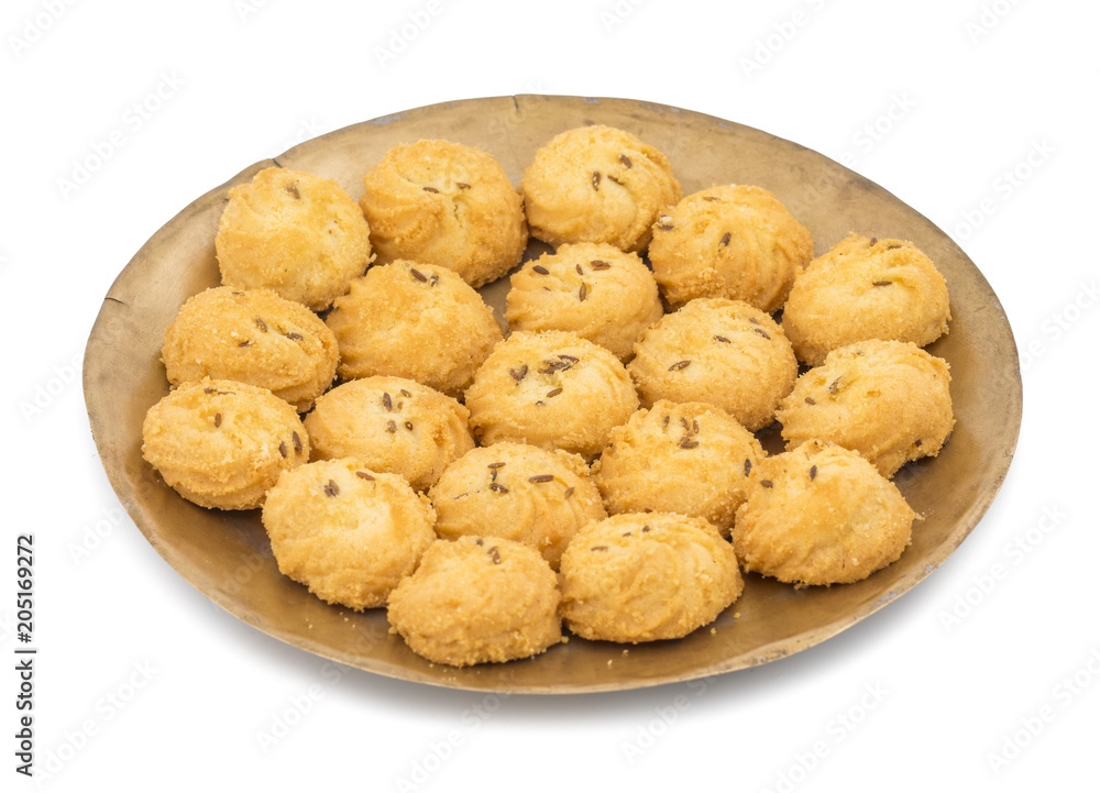 Salted Flavor Small Cumin Cookies or Biscuits Served in Plate Also Know as Nan Khatai or Jeera Cookies is a tea time Snack. Little Sweet and Little Salty isolated on White Background Salted Flavor Small Cumin Cookies or Biscuits Served in Plate Also Know as Nan Khatai or Jeera Cookies is a tea time Snack. Little Sweet and Little Salty isolated on White Background