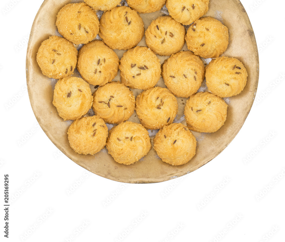 Salted Flavor Small Cumin Cookies or Biscuits Served in Plate Also Know as Nan Khatai or Jeera Cookies is a tea time Snack. Little Sweet and Little Salty isolated on White Background Salted Flavor Small Cumin Cookies or Biscuits Served in Plate Also Know as Nan Khatai or Jeera Cookies is a tea time Snack. Little Sweet and Little Salty isolated on White Background