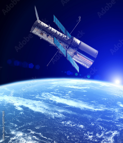 Billede på lærred The Hubble space telescope in the orbit of planet Earth