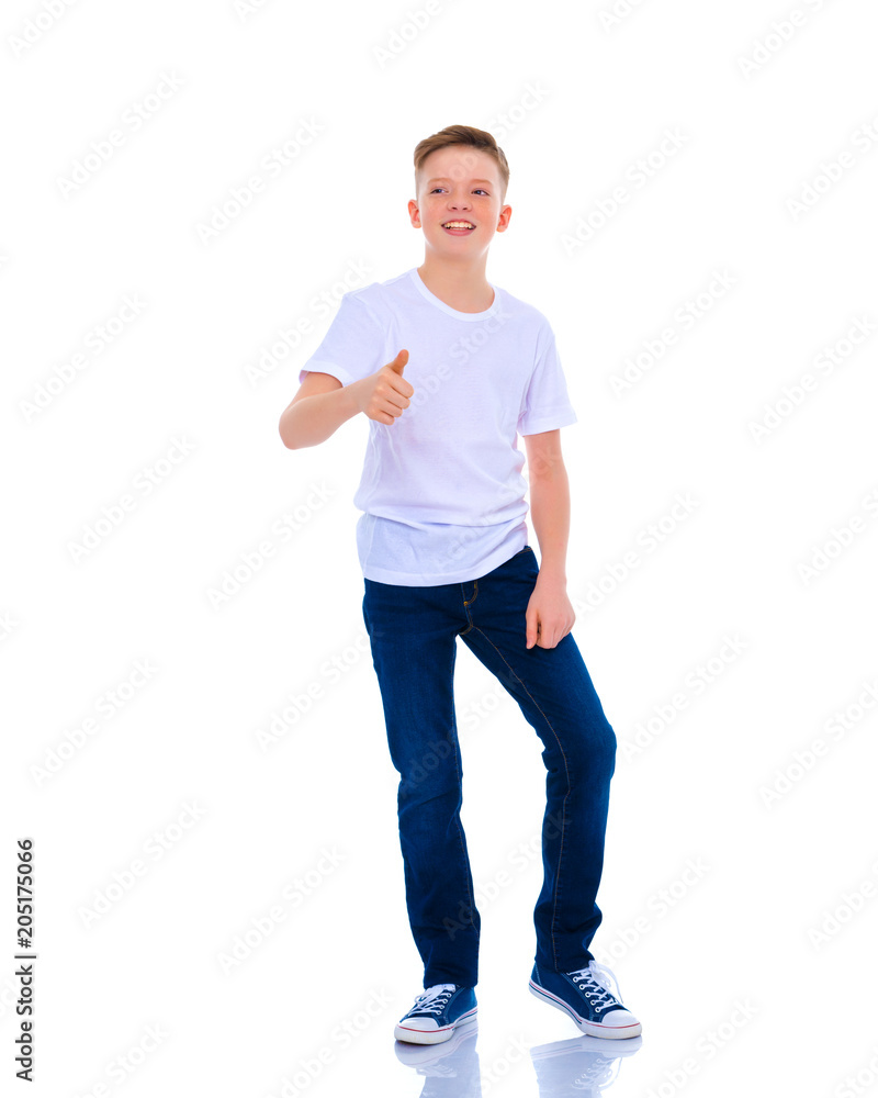 A little boy is holding a finger up. A little boy is holding a finger up.