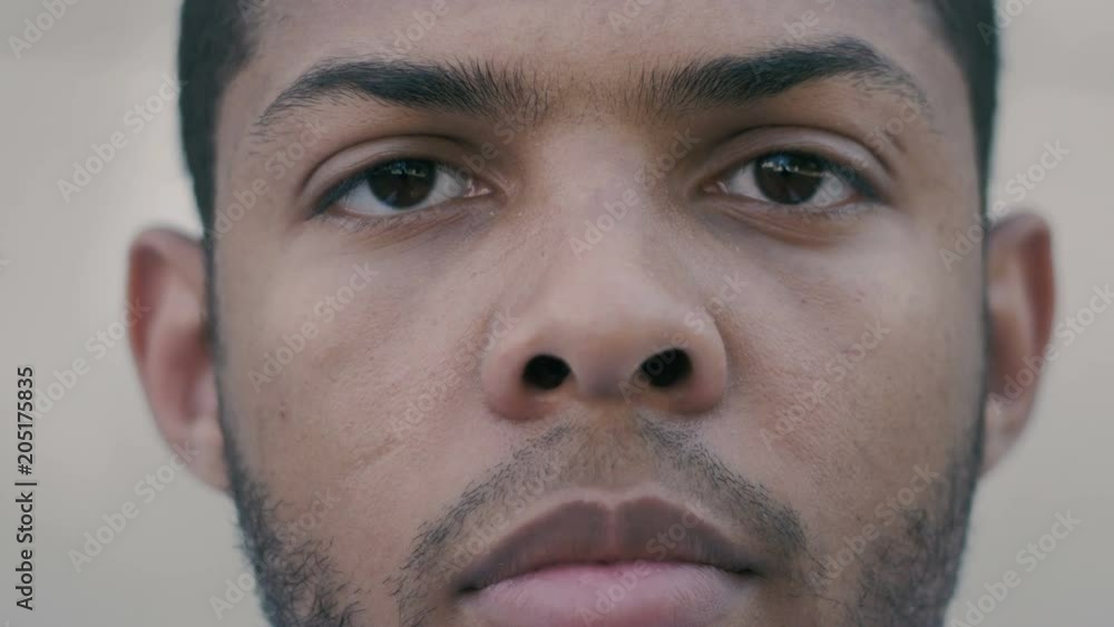 Close up Portrait of Young African American man outdoor Close up Portrait of Young African American man outdoor