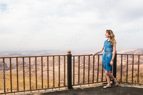 Female tourist on the place for seeing beatiful view of mountain © keleny