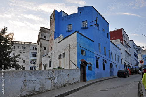 Street of the ancient Chefchaouen in Morocco late afternoon.