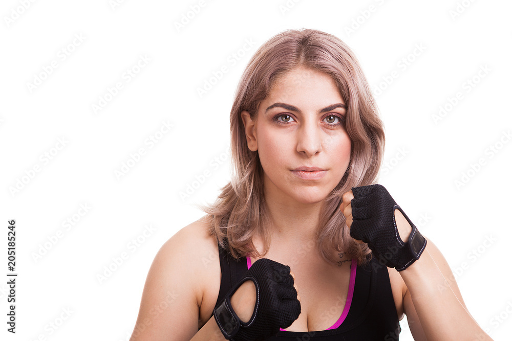 Woman wearing sport gloves and clothes isolated over white background in studio photo Woman wearing sport gloves and clothes isolated over white background in studio photo