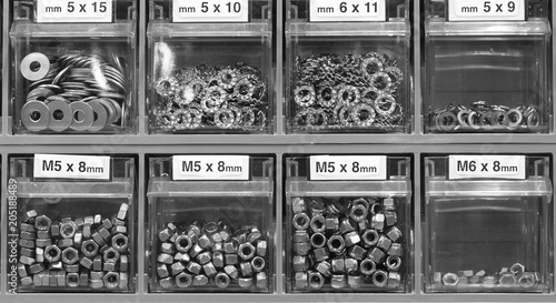 many boxes with Nuts bolts and screws in boxes photo
