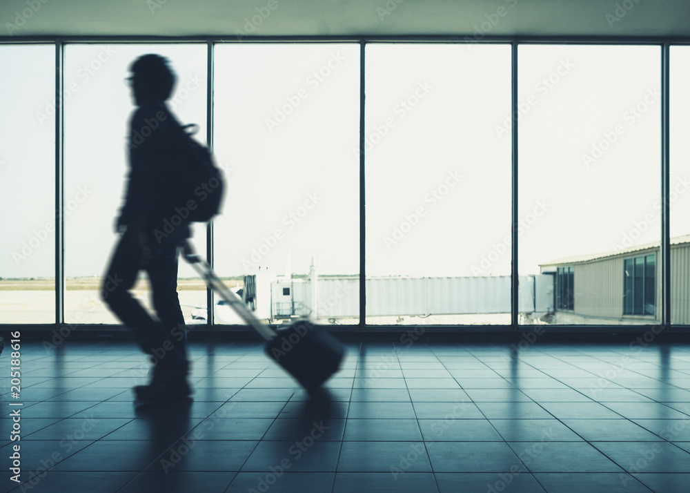 Traveler walking with Luggage arrival Terminal Airport People Travel concept