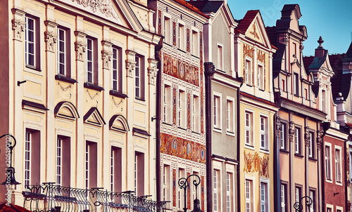 Vintage stylized old houses facades at Poznan Old Market Square, Poland.