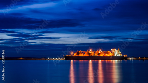 GAS CARRIER - Ship in the port at sunrise photo