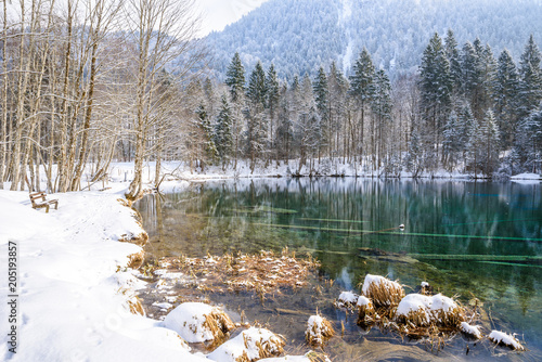 Lake Christlessee in winter at trettach valley near oberstdorf, idyllic south bavarian landscape in Germany photo