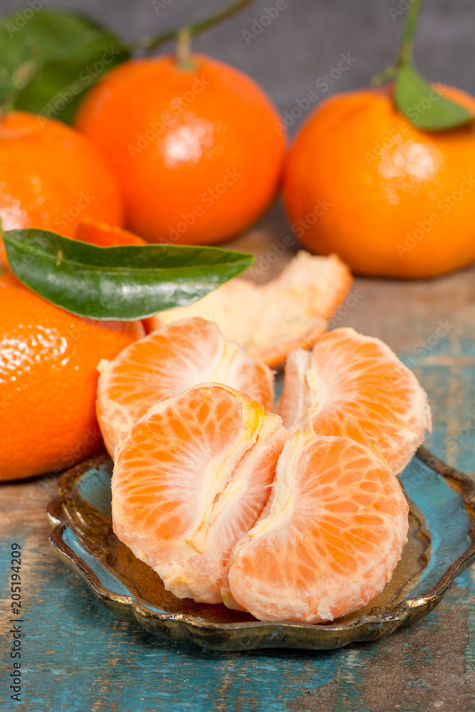 Ripe colorful tropical citrus fruits, mandarins or clementines close up
