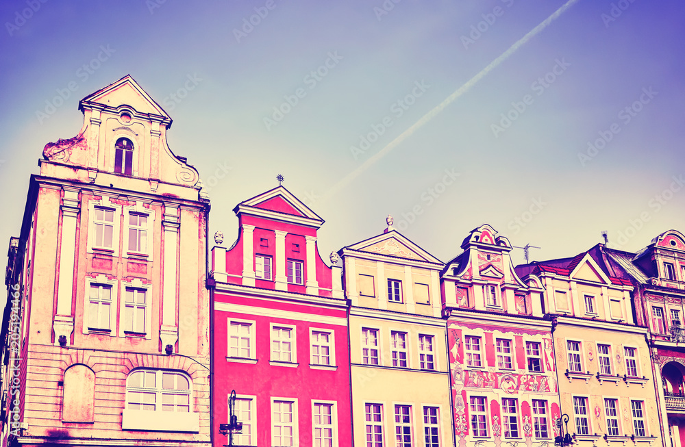 Retro toned old houses facades at Poznan Old Market Square, Poland.