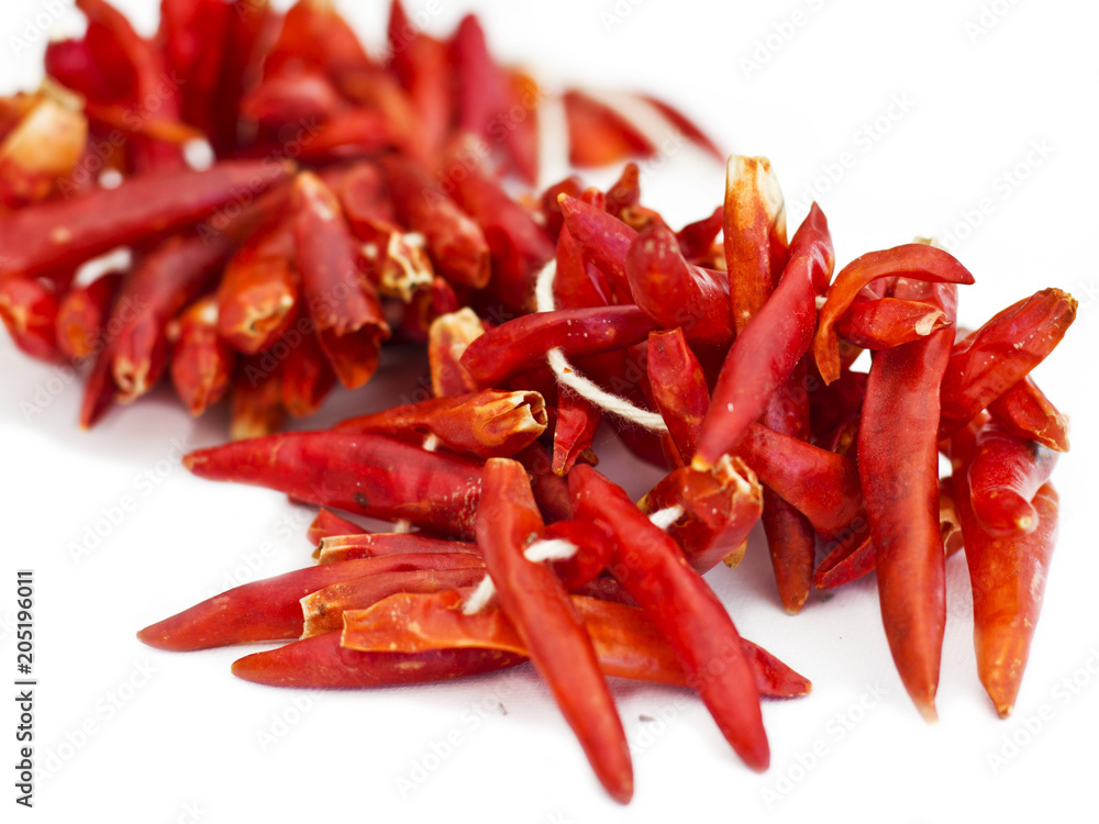 Dry hot red chilli pepper on white background