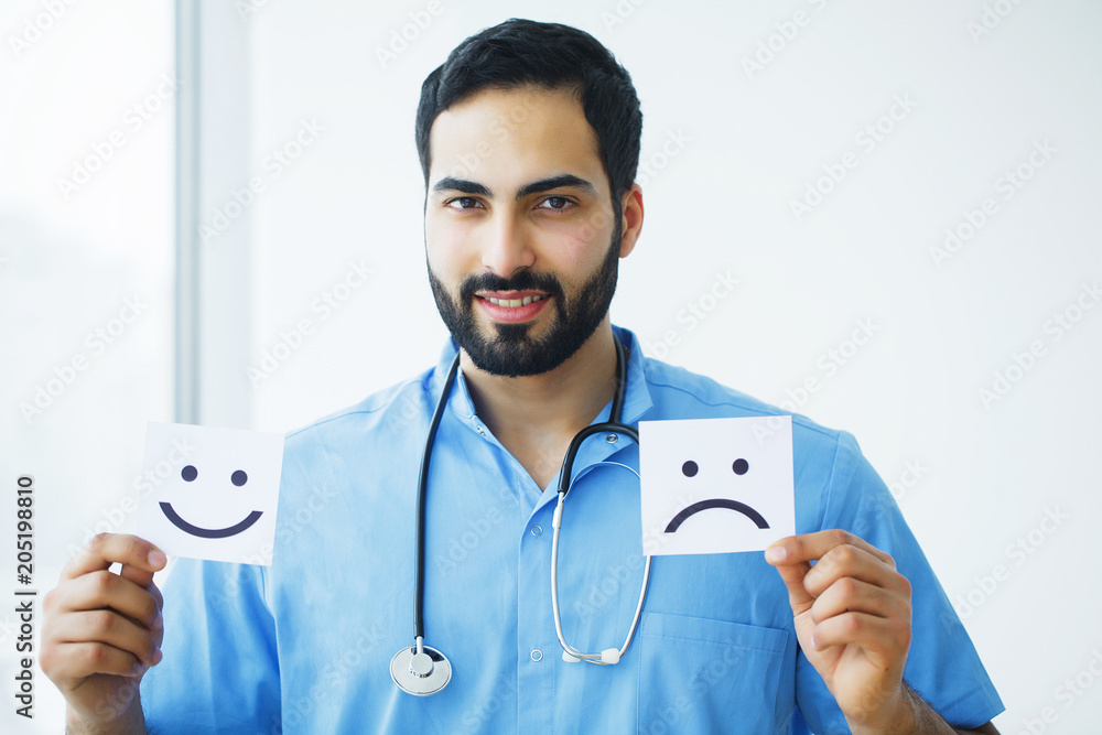 Health Care. Doctor Holding a Cards With Symbol Fun and Sad Smile, Medical Concept Health Care. Doctor Holding a Cards With Symbol Fun and Sad Smile, Medical Concept