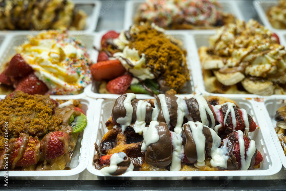 Fototapeta premium Belgian Waffles in Grand Place, Bruxelles, Belgium