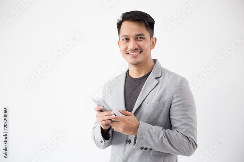 Asian Young Business with smart cell phone