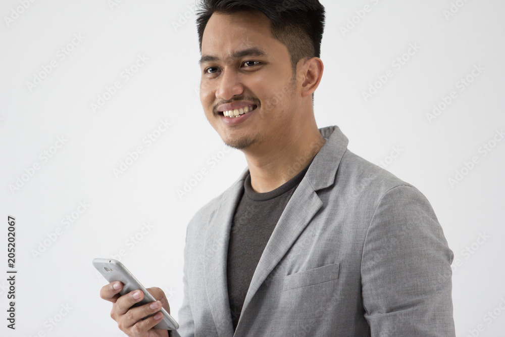 Asian Young Business with smart cell phone Asian Young Business with smart cell phone