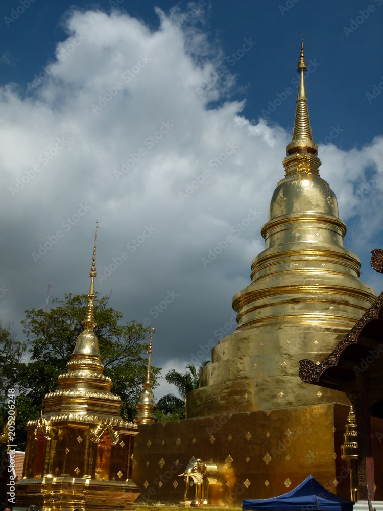 Fototapeta premium Pagoda at Wat Phra Sing in Chiang Mai; Thailand with gray-looking sky or overcast sky