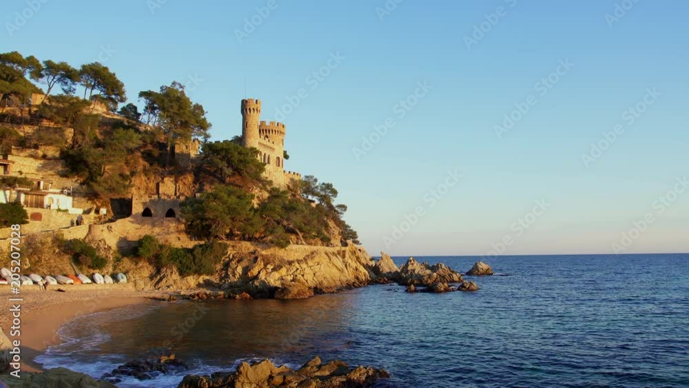 Landscape of Lloret de Mar Castle and its beach in a sunny afternoon, Spain. Landscape of Lloret de Mar Castle and its beach in a sunny afternoon, Spain.