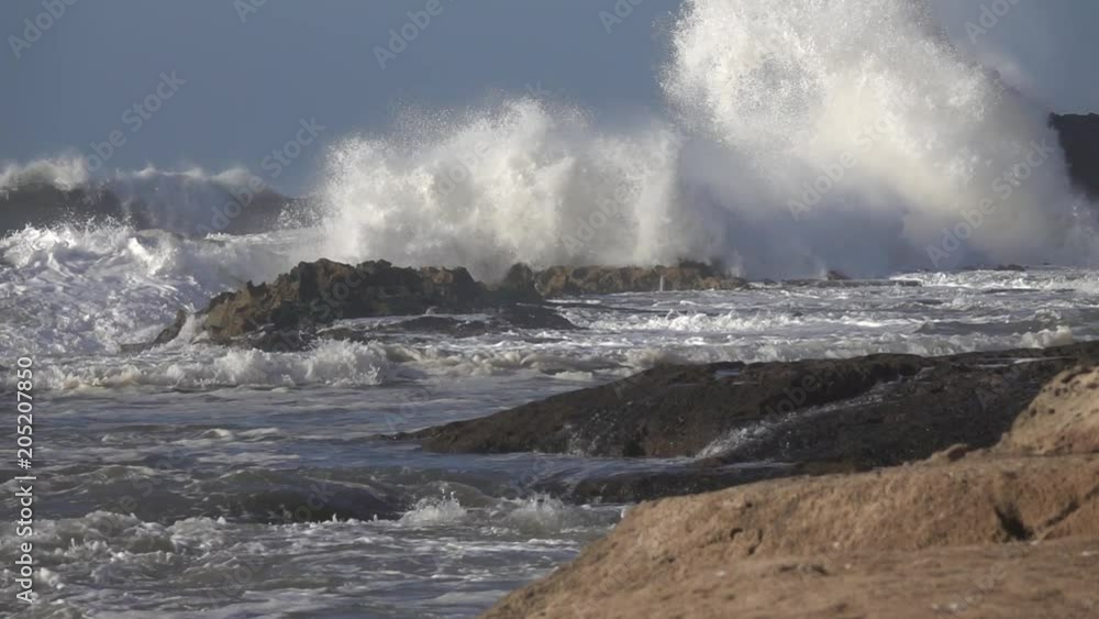 Splashes from atlantic ocean big waves over cliffs, slow motion Splashes from atlantic ocean big waves over cliffs, slow motion