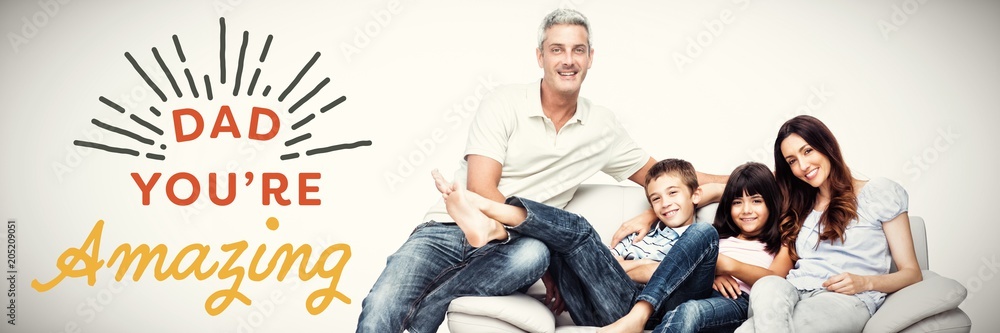 Composite image of family sitting on sofa smiling at camera Composite image of family sitting on sofa smiling at camera