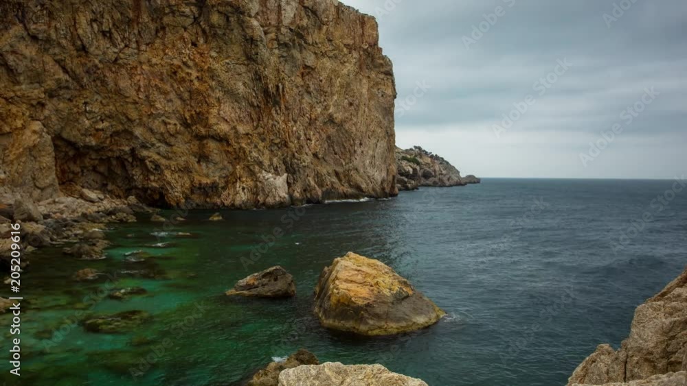 timelapse of the the rocky and cliff lined coastline at estartit in catalunya, spain timelapse of the the rocky and cliff lined coastline at estartit in catalunya, spain