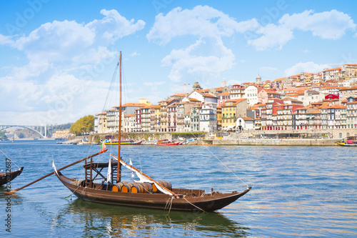 Typical portuguese wooden boats, called -barcos rabelos- used in the past to transport the famous port wine towards the cellars of the city (Portugal - Europe)
