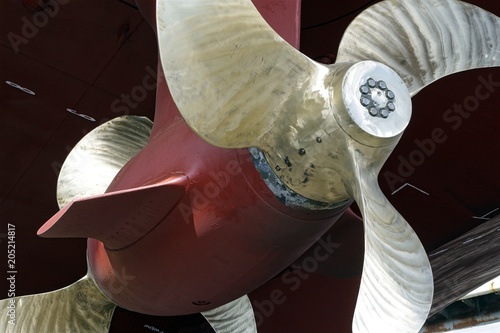 Double propeller on a supply vessel under repairs. Shipyard industry, repairs, refurbishments.