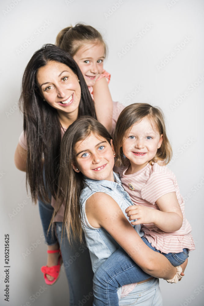 caucassian mother with child girl in studio white