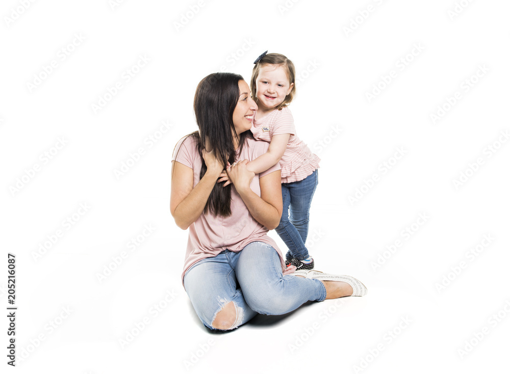 pretty mother standing with her cute daughter pretty mother standing with her cute daughter