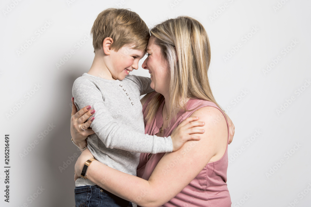 Mother and son on studio white background Mother and son on studio white background