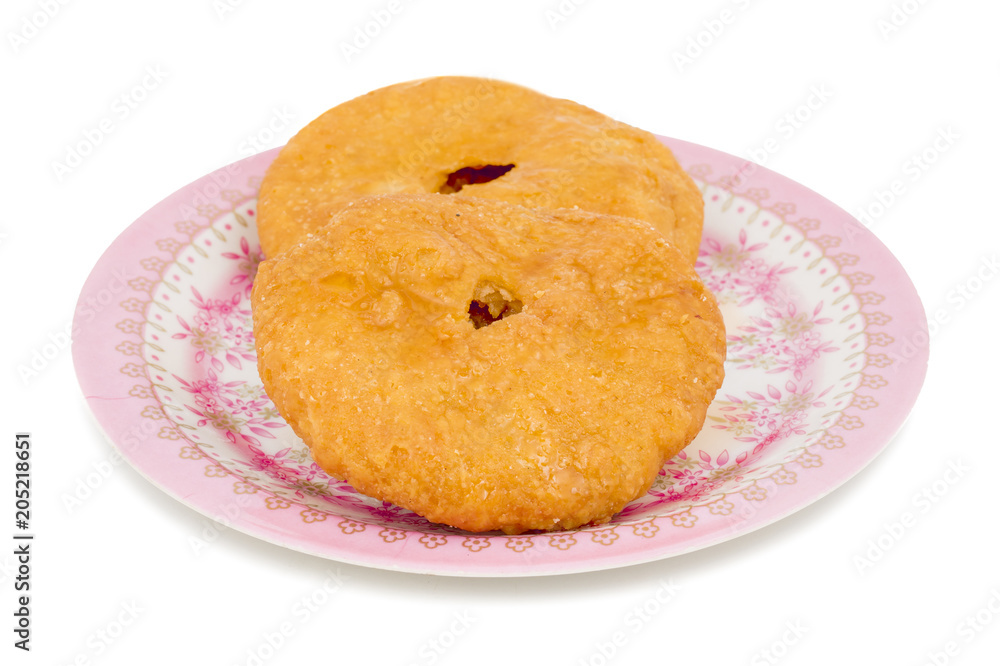 Indian Traditional Sweet Kachori Also Know As Mawa Kachori, Kachauri or Kachodi, Stuffed Kachori With Condensed Milk, Cheese and Dry Fruits And Served With Sugar Syrup isolated on White Background Indian Traditional Sweet Kachori Also Know As Mawa Kachori, Kachauri or Kachodi, Stuffed Kachori With Condensed Milk, Cheese and Dry Fruits And Served With Sugar Syrup isolated on White Background