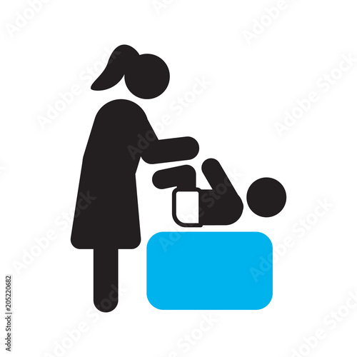 Mother changing diapers silhouette icon