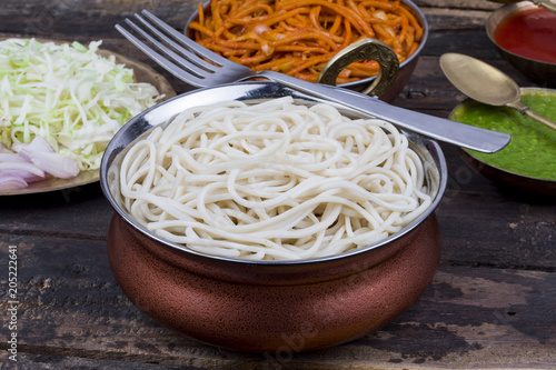 Boiled Chow Mein or Hakka Noodles Served With Chutney on Wooden Background