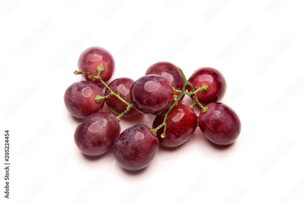 Branch of red grapes isolated on white background Branch of red grapes isolated on white background