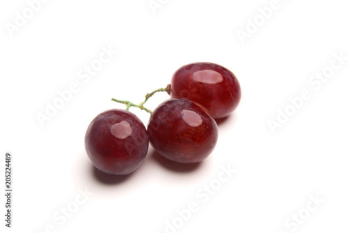 Three grapes isolated on white background