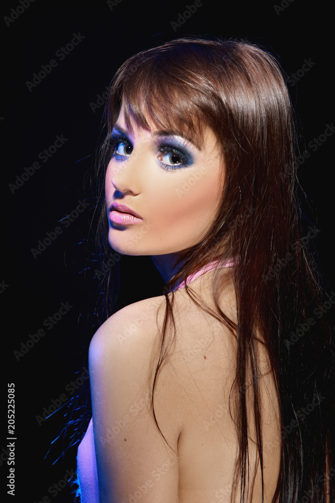 Naklejka premium closeup portrait of stylish young woman with glamorous evening m