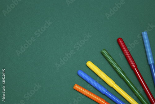 Colored Crayons Dark Background Copy Space. Back to School. School supplies.