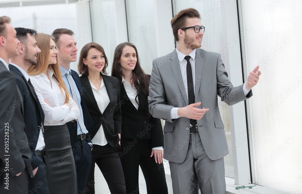 businessman and a group of young business people